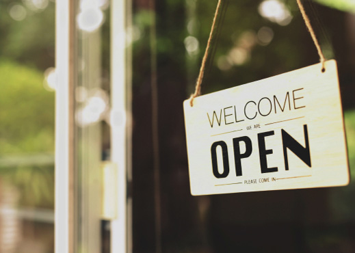 Close up of open sign on storefront